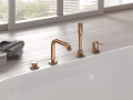 Elegancka bateria wannowa Grohe 4-otworowa w kolorze Warm Sunset – seria Essence Professional